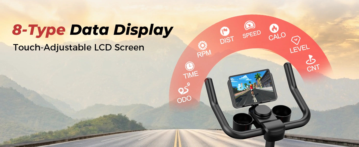 Fitnesscykel med digitalt display og baggrund med bjergvej